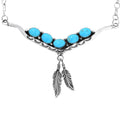 Collier navajo en argent sterling avec turquoises et plumes