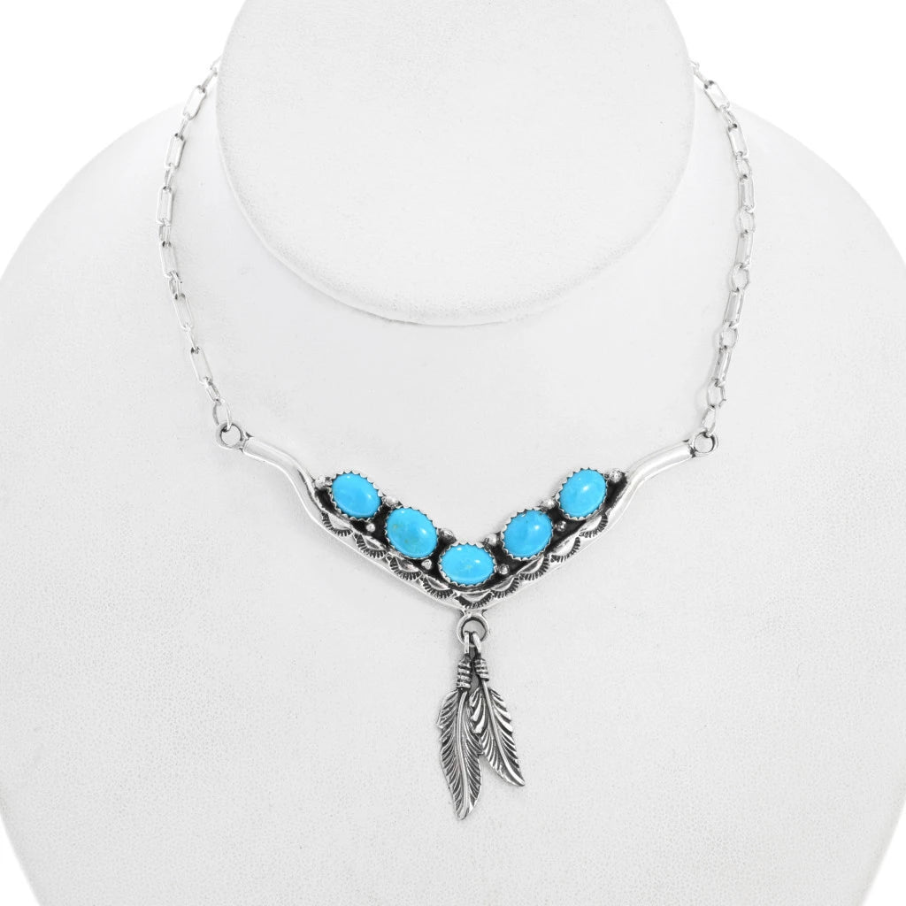 Collier navajo en argent sterling avec turquoises et plumes