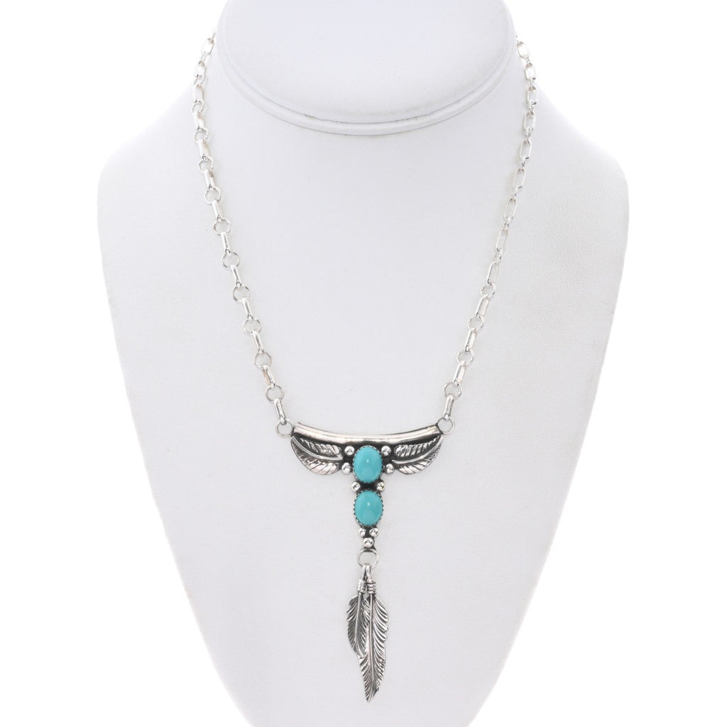 Collier navajo en Y avec turquoises Sonoran et plumes