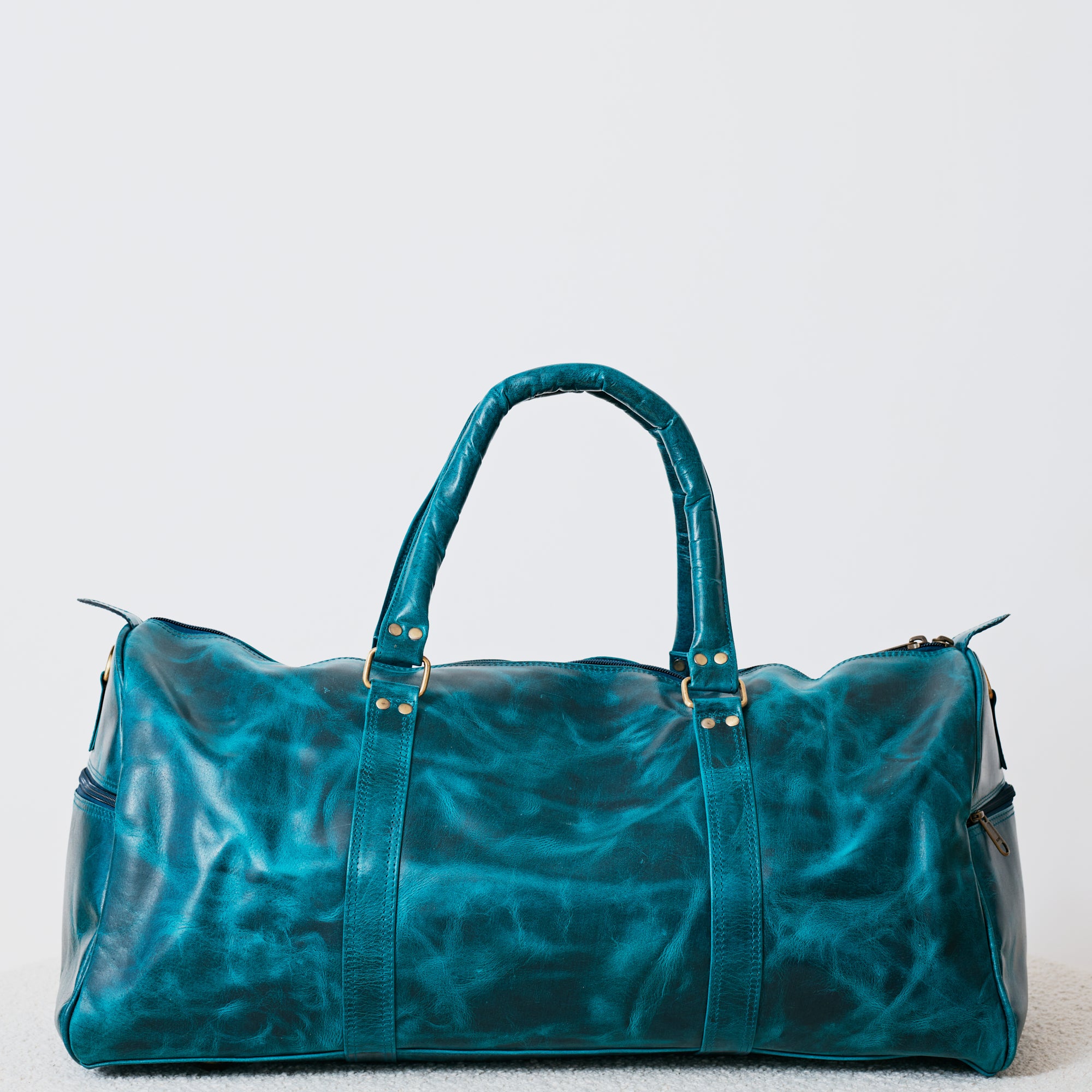 Sac duffle western turquoise en cuir véritable