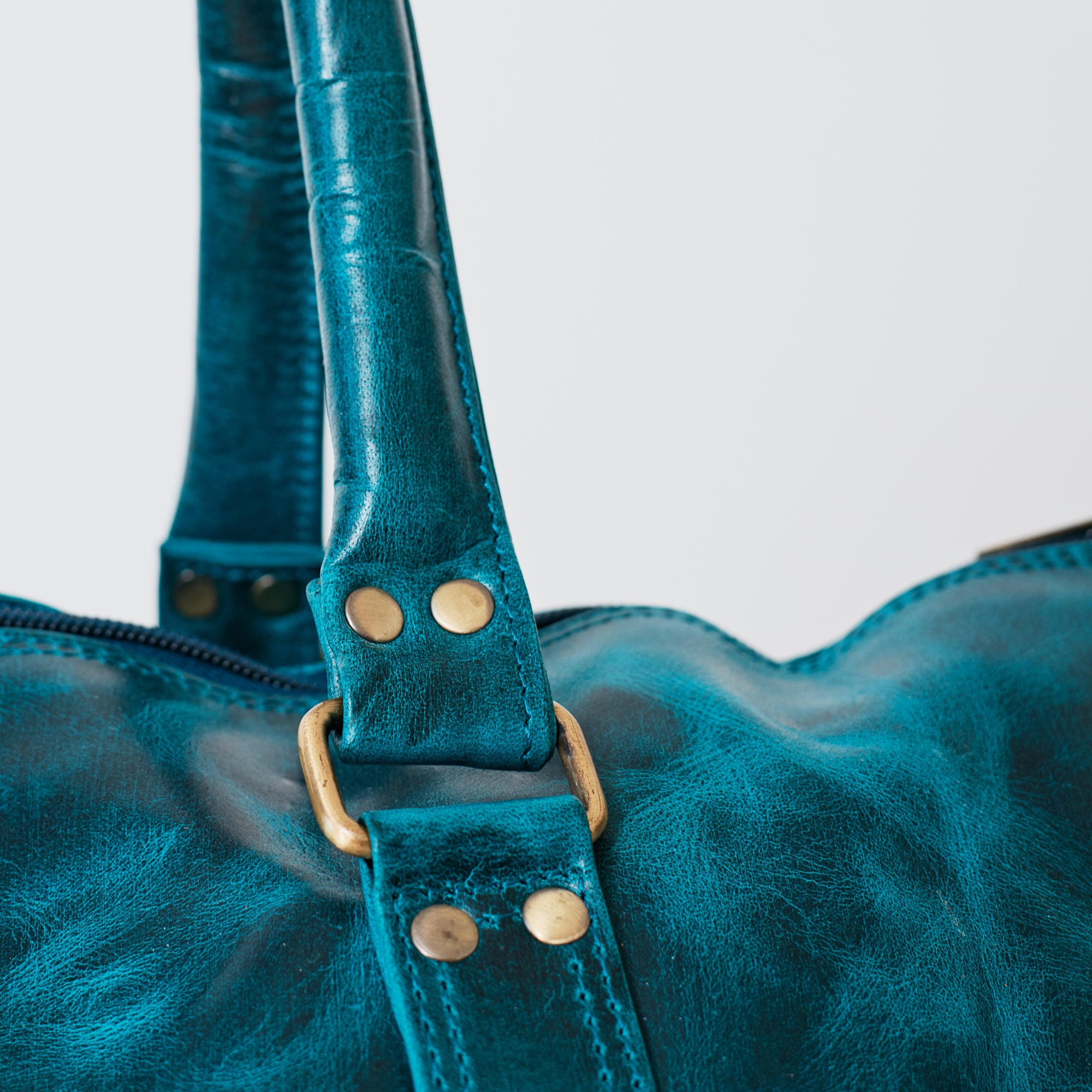 Sac duffle western turquoise en cuir véritable