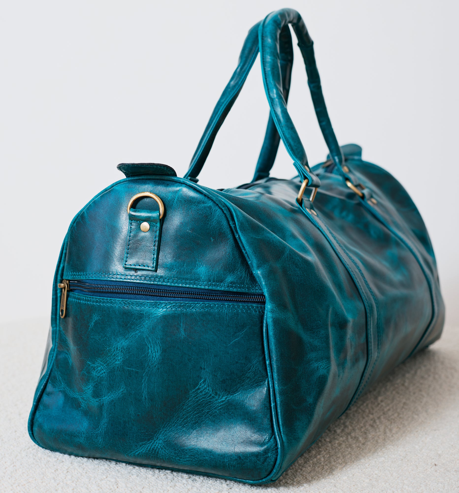 Sac duffle western turquoise en cuir véritable