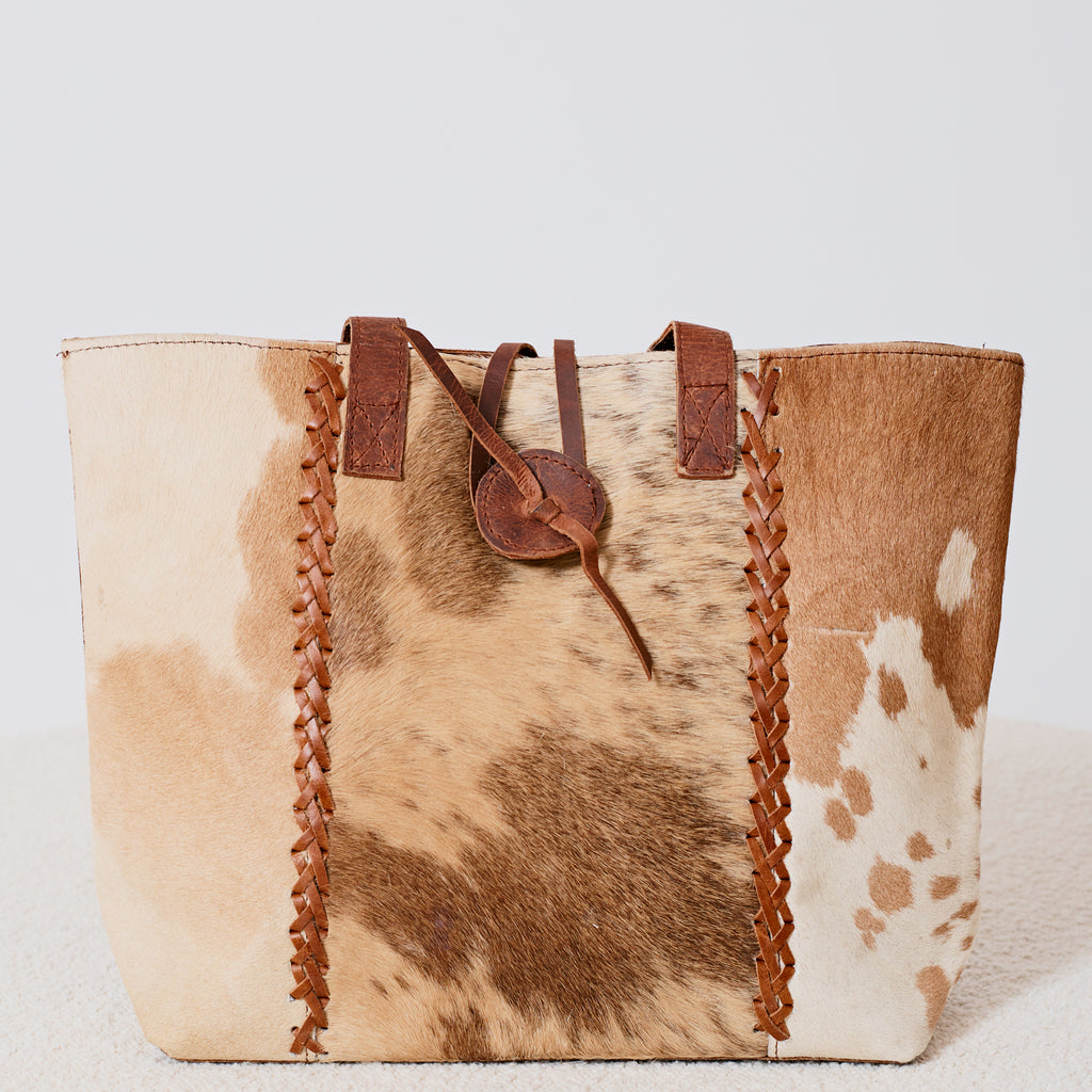 Sac à main western en poil de vache tressé