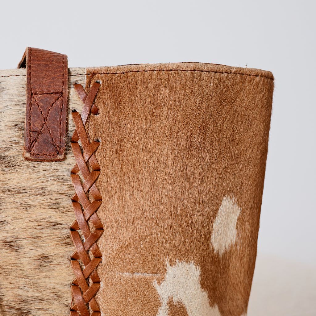 Sac à main western en poil de vache tressé