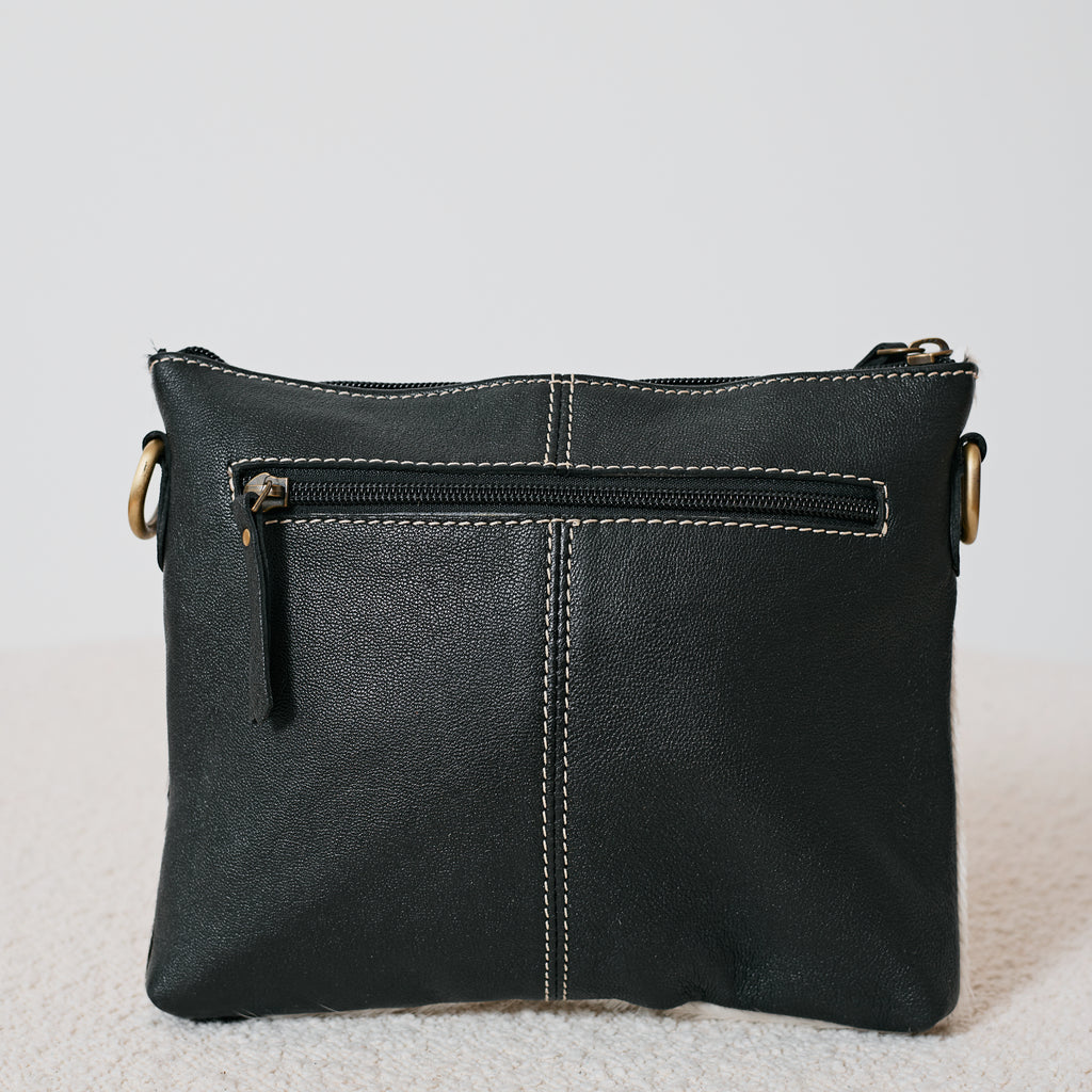 Pochette western damier en poil de vache