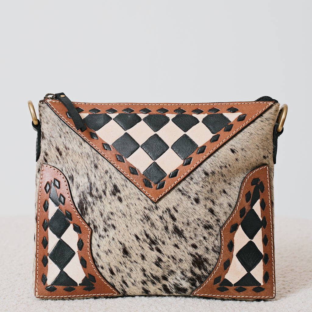 Pochette western damier en poil de vache