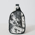 Sac bandoulière western en poil de vache noir et blanc