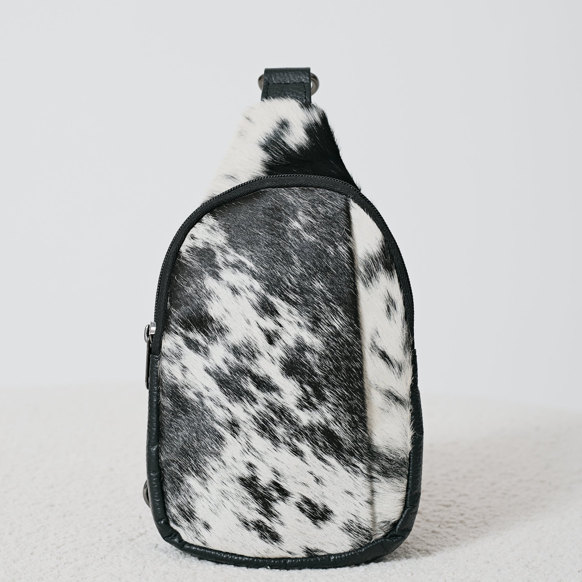 Sac bandoulière western en poil de vache noir et blanc