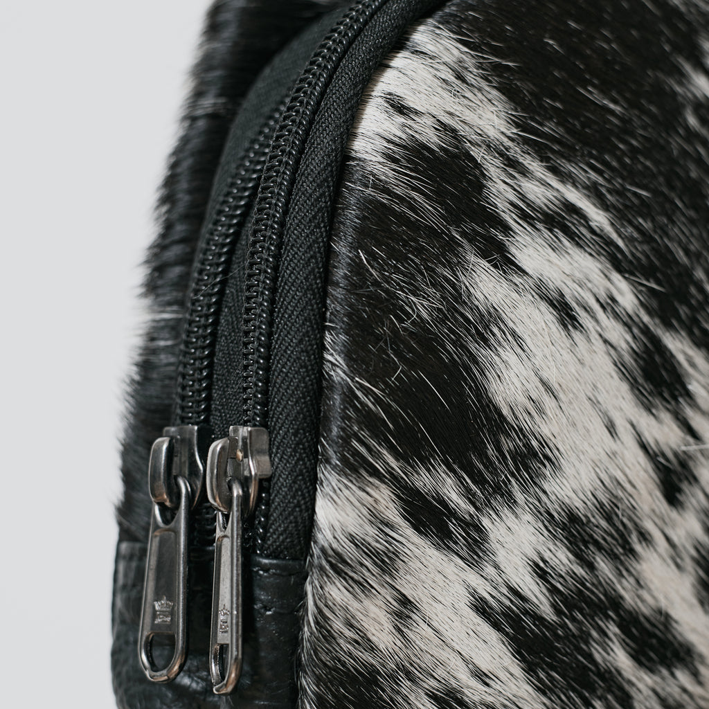Sac bandoulière western en poil de vache noir et blanc