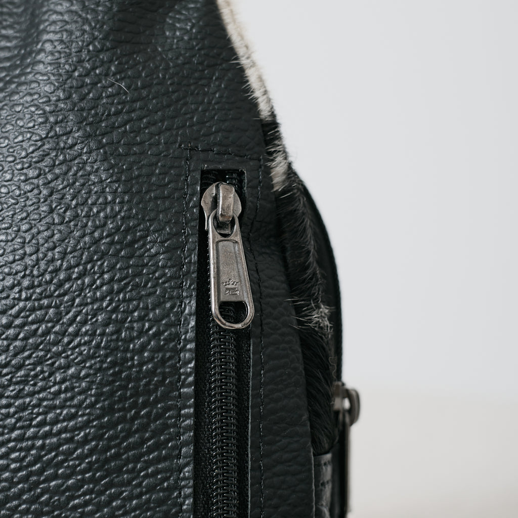 Sac bandoulière western en poil de vache noir et blanc