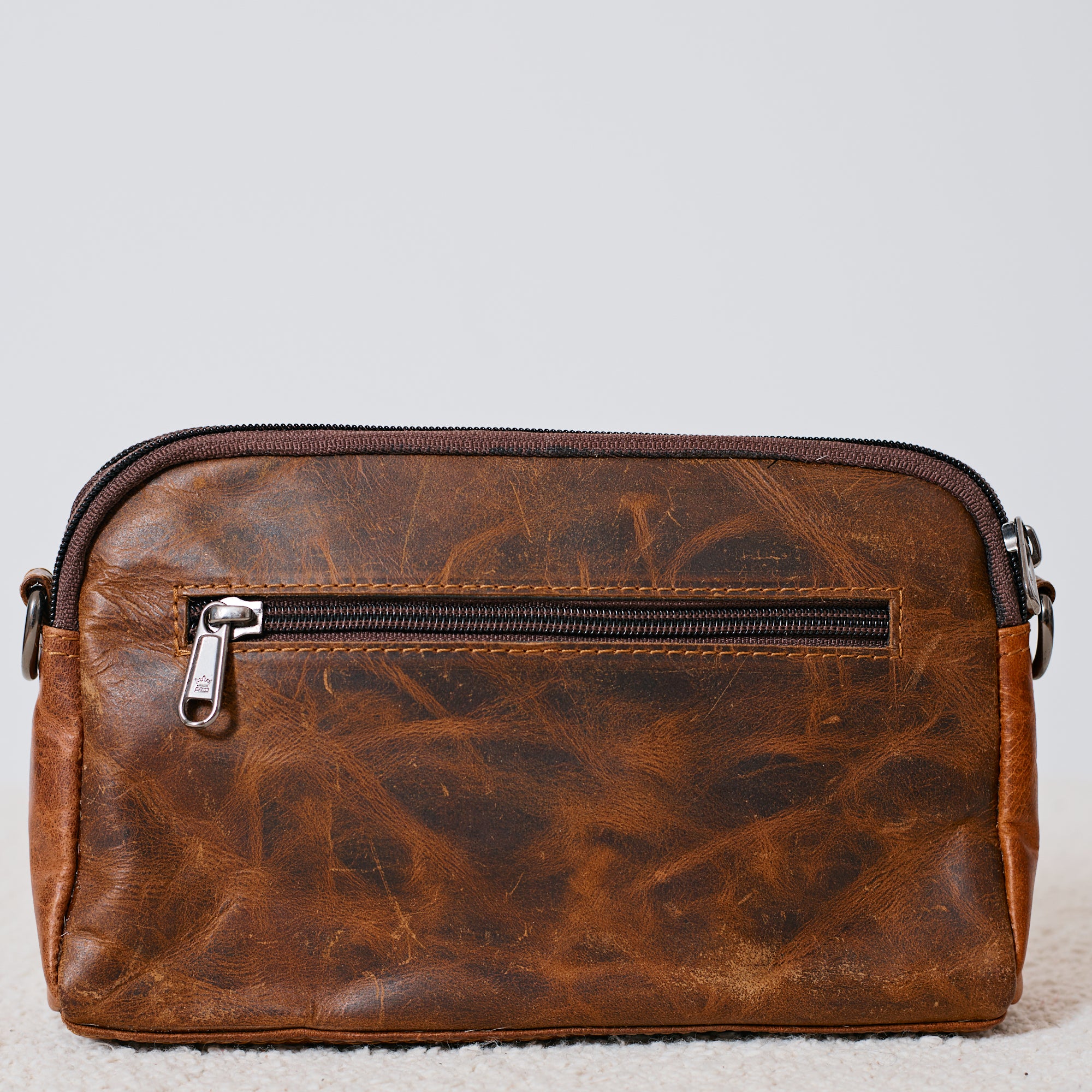 Pochette western en poil de vache brun et blanc