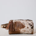 Pochette western en poil de vache avec pompon